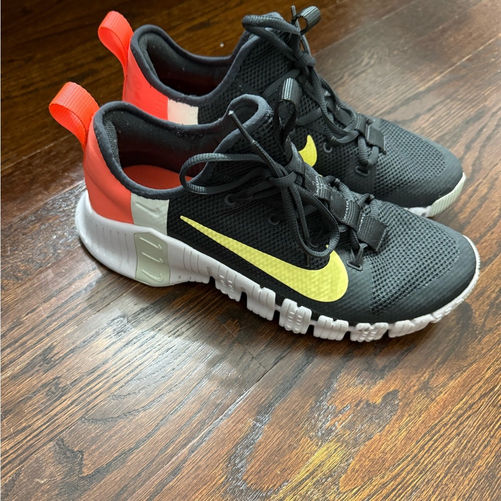Nike Kids Black and Red Sneakers with Yellow Swoosh
